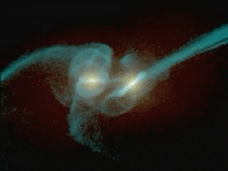 Simulation of two colliding galaxies. Two galaxies, seen edge on, are in the last stages of colliding. The two, coin-shaped galaxies have bright centers that approach each other, and then quickly orbit each other a few times as they get closer and closer until the merge together. Streams of gas, dust and stars stream behind the two galaxies, ultimately tangling together into a single giant ellipse around the merged galactic centers.