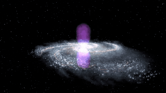 In this animated GIF, the camera pans back and forth as the Milky Way’s spiral arms appear to dance. At the center of the spiral structure are two magenta bubbles, one each extending above and below the plane of the Milky Ways’ arms.