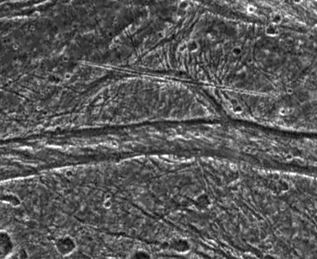 APOD: 1997 December 09 – Mysterious Features on Ganymede