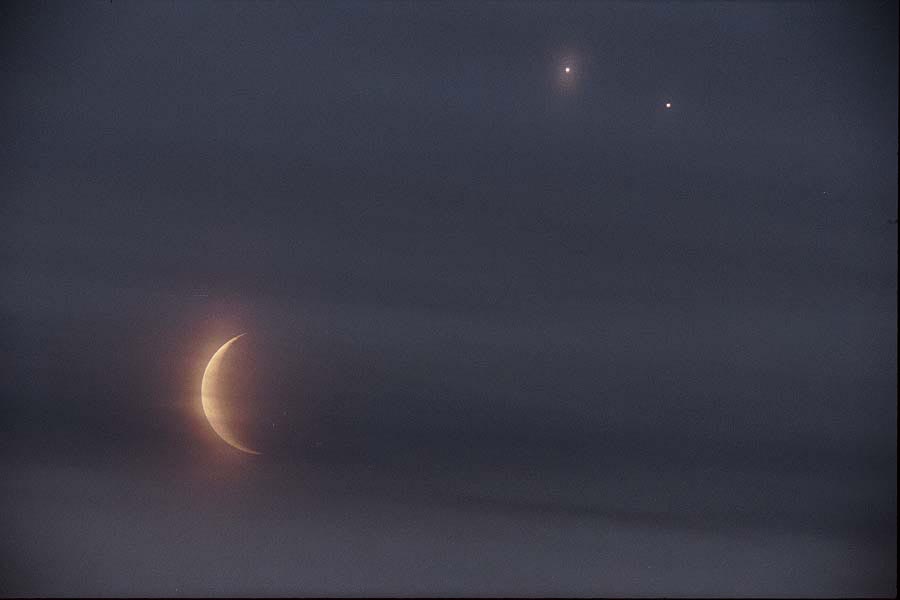 APOD: 1998 April 28 – A Rare Double Conjunction Eclipse