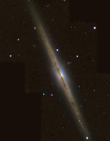 APOD: 1998 December 20 – Edge On Spiral Galaxy NGC 891