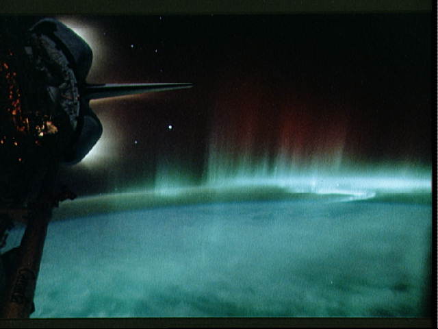 APOD: 1998 February 22 – Southern Lights and Shuttle Glow