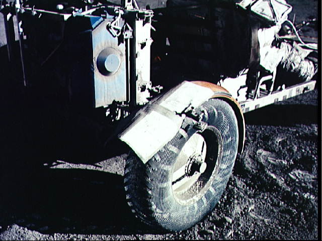 APOD: 1998 March 27 – Lunar Dust and Duct Tape