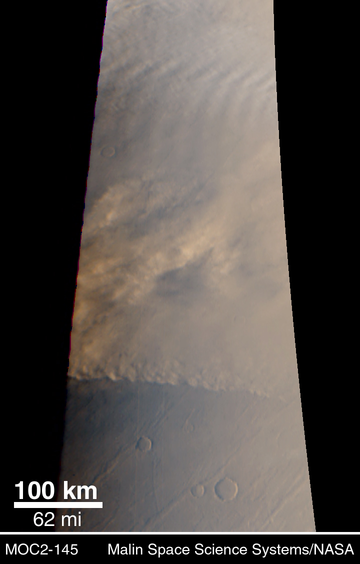 APOD: 1999 August 09 – A Martian Dust Storm Approaches