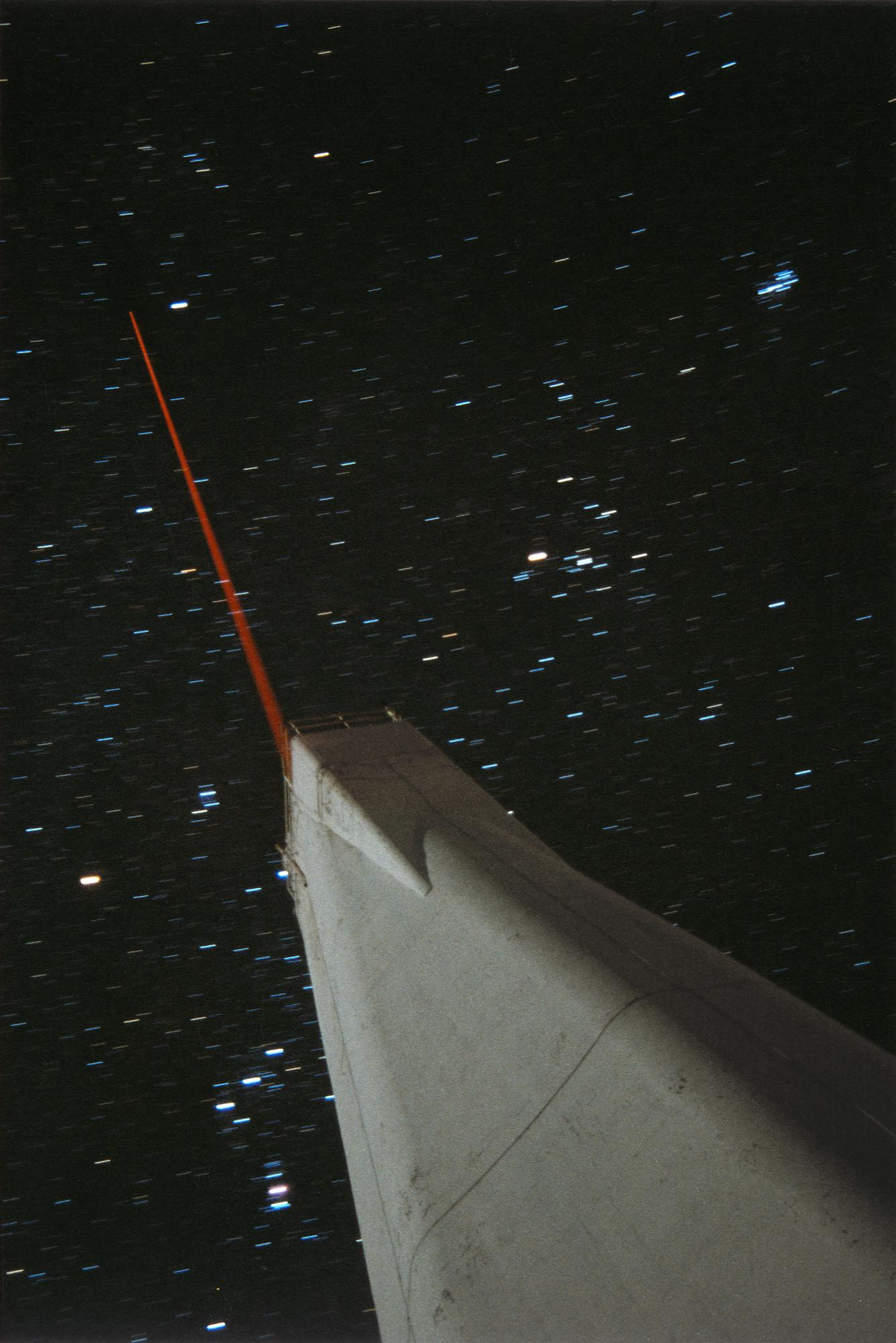 APOD: 2001 April 25 – Space Laser Creates Artificial Star