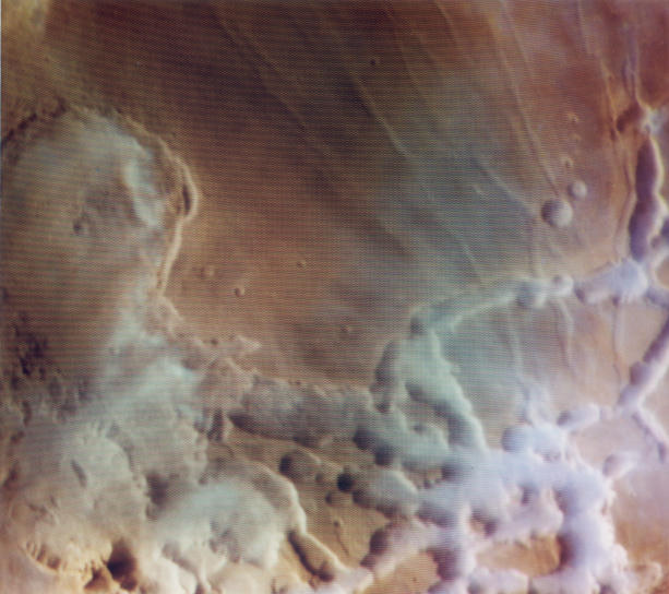 APOD: 2001 April 17 – Colorful Water Clouds Over Mars
