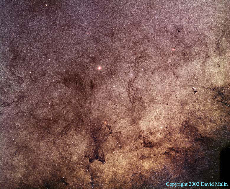 APOD: 2002 December 23 – Stars and Dust Through Baade’s Window