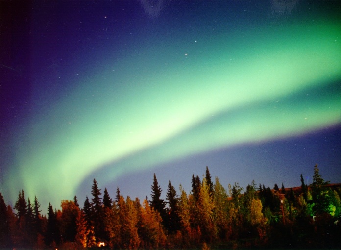 APOD: 2002 January 1 – The Secret of the Black Aurora