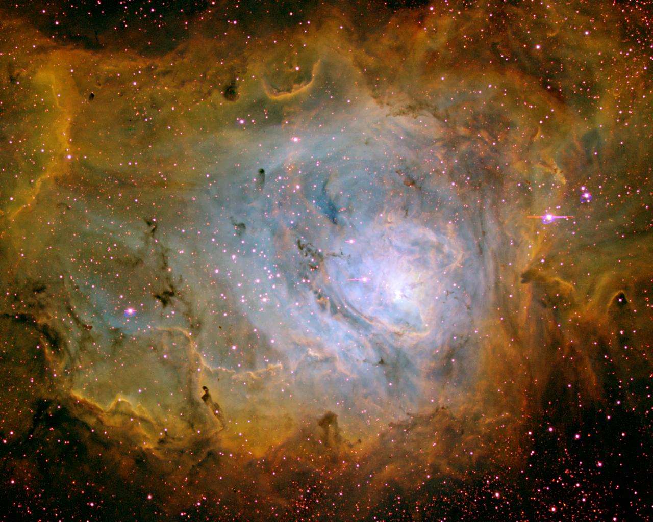 APOD: 2002 October 6 – The Lagoon Nebula in Three Colors