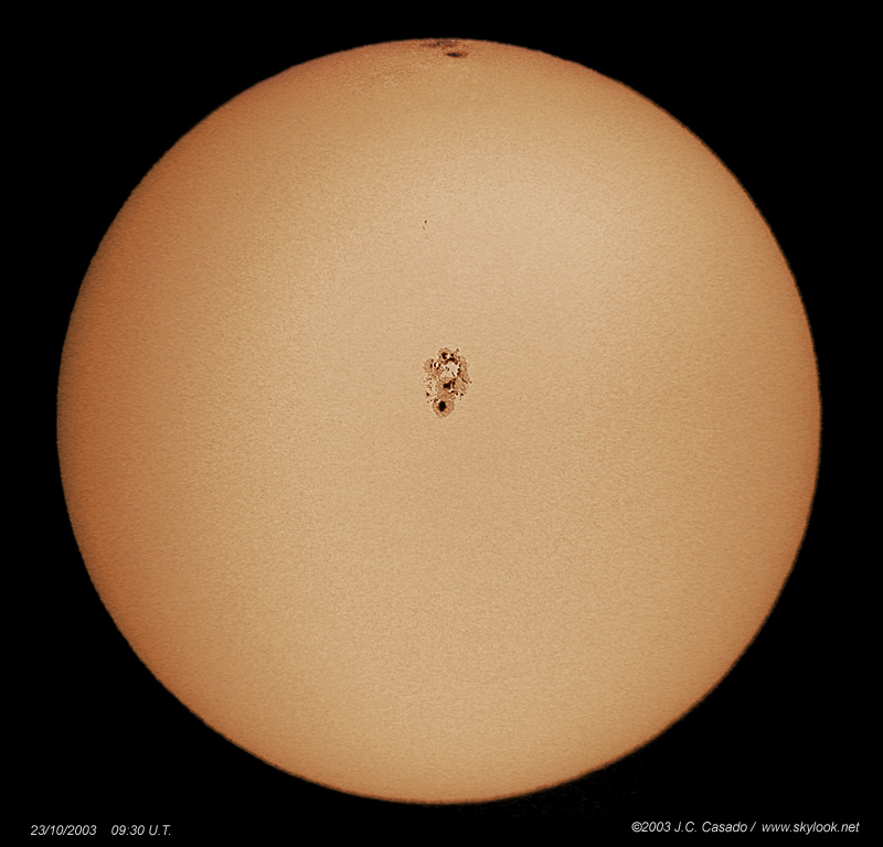 APOD: 2003 October 27 – Large Sunspot Groups 10484 and 10486