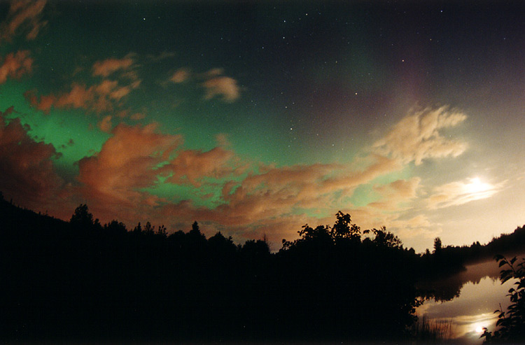 APOD: 2003 September 10 – Aurora Over Clouds