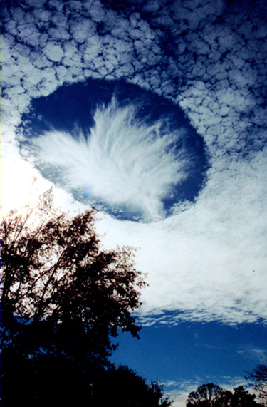 APOD: 2004 January 12 – A Hole Punch Cloud Over Alabama