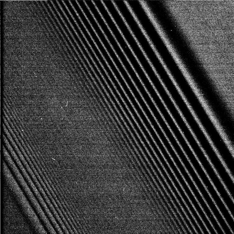 APOD: 2004 July 5 – Cassini Images Density Waves in Saturns Rings