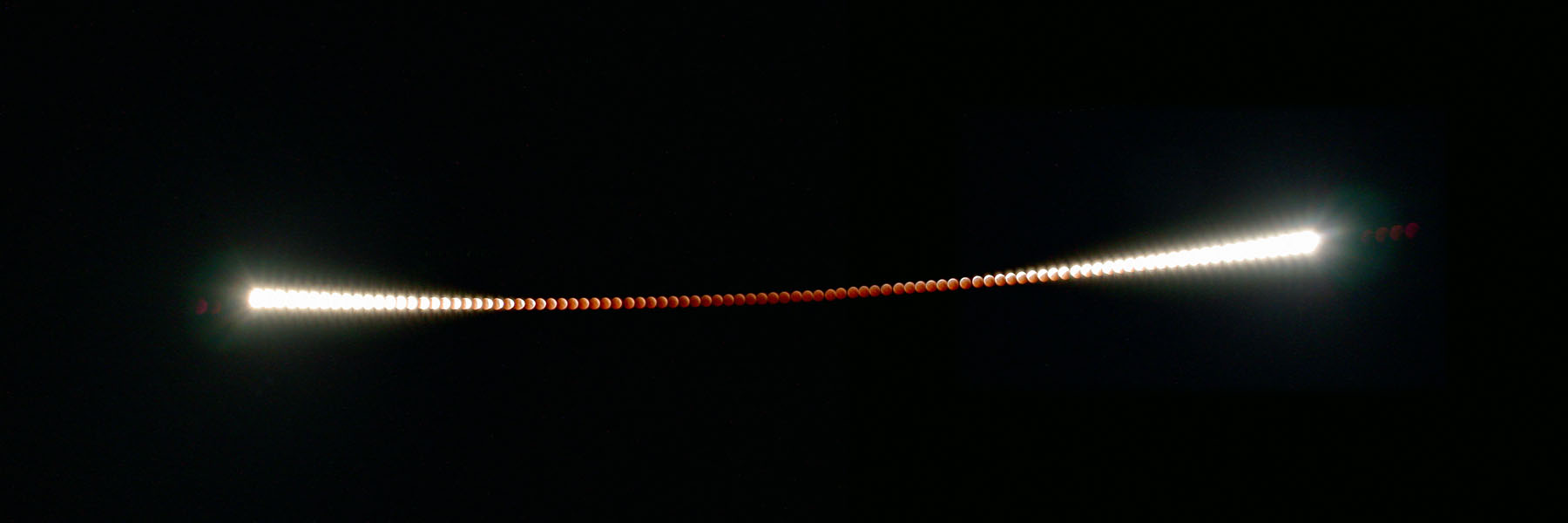 APOD: 2004 November 3 – A Time Lapse Lunar Eclipse