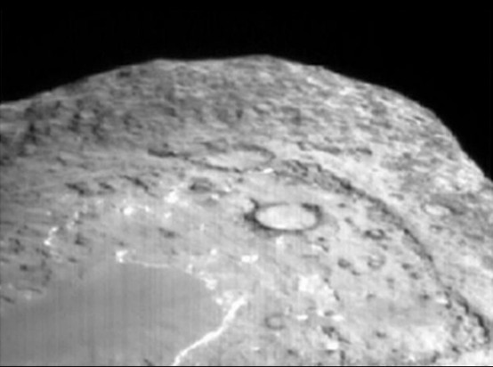 APOD: 2005 July 6 - The Landscape on Comet Tempel 1 - NASA Science