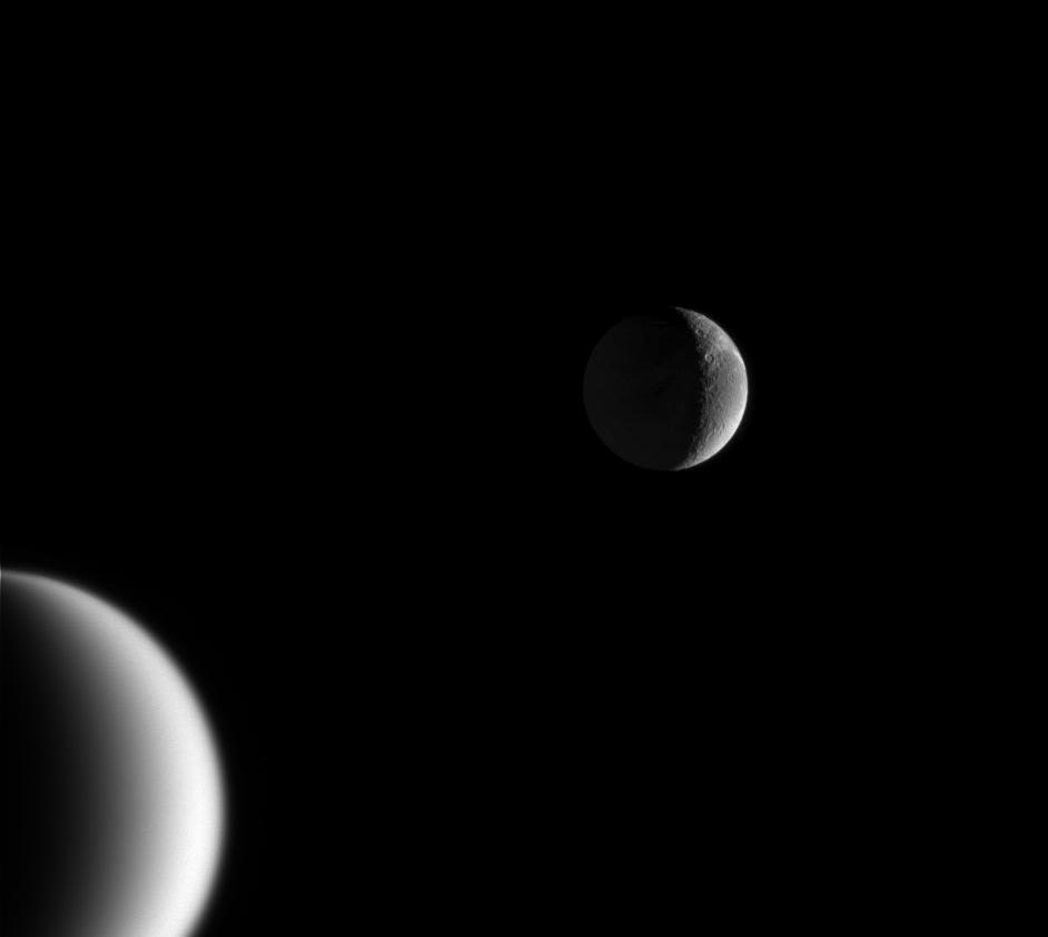 APOD: 2005 March 29 – Crescents of Titan and Dione