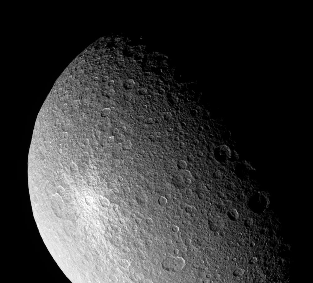 APOD: 2005 May 30 – A Great White Spot on Rhea