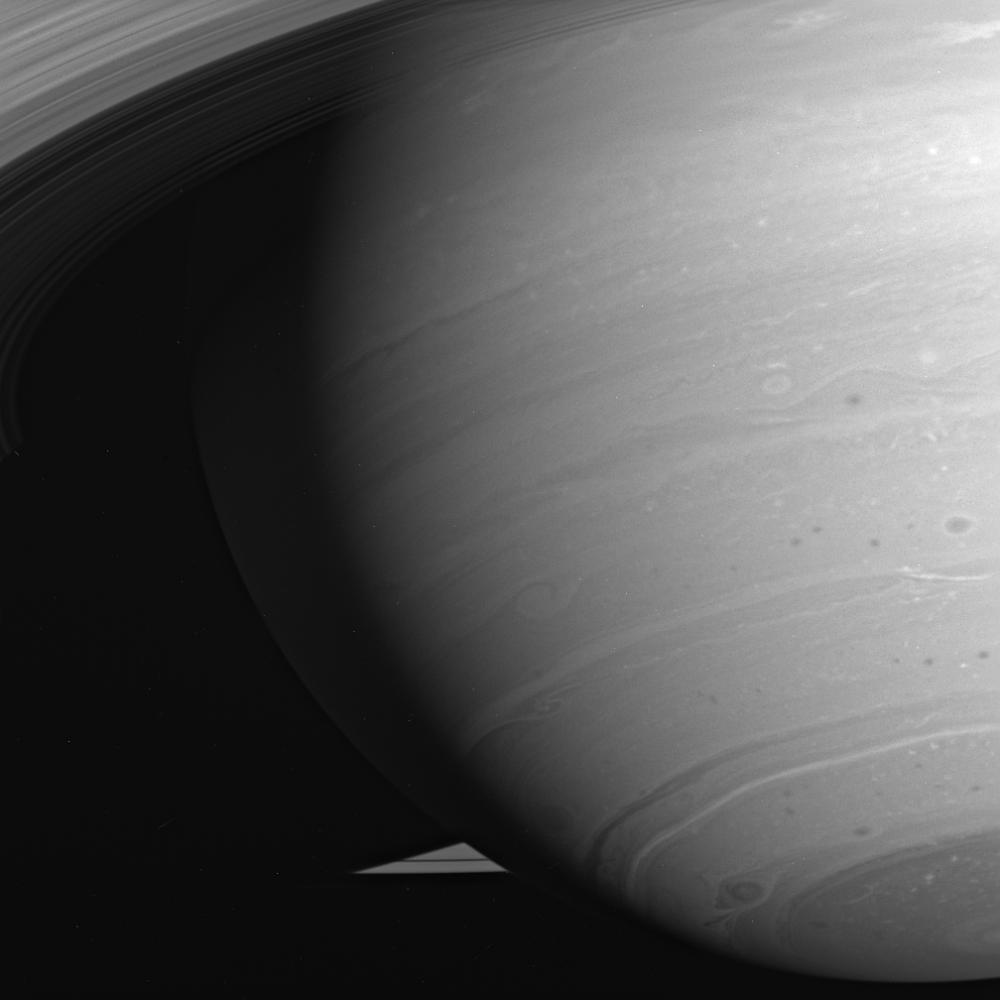 APOD: 2005 October 10 – The Swirling Storms of Saturn