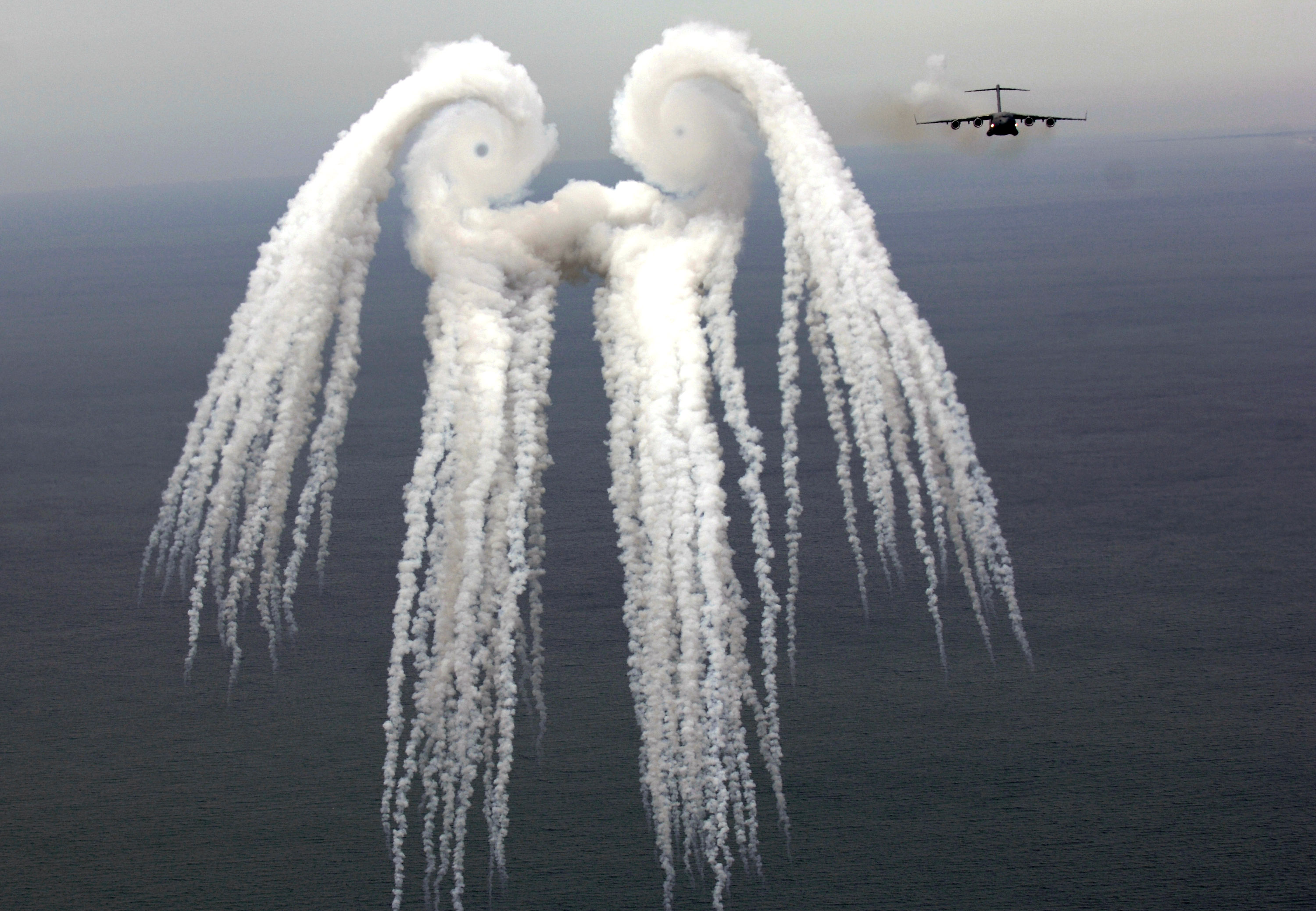 APOD: 2006 August 22 – A Smoke Angel from Airplane Flares