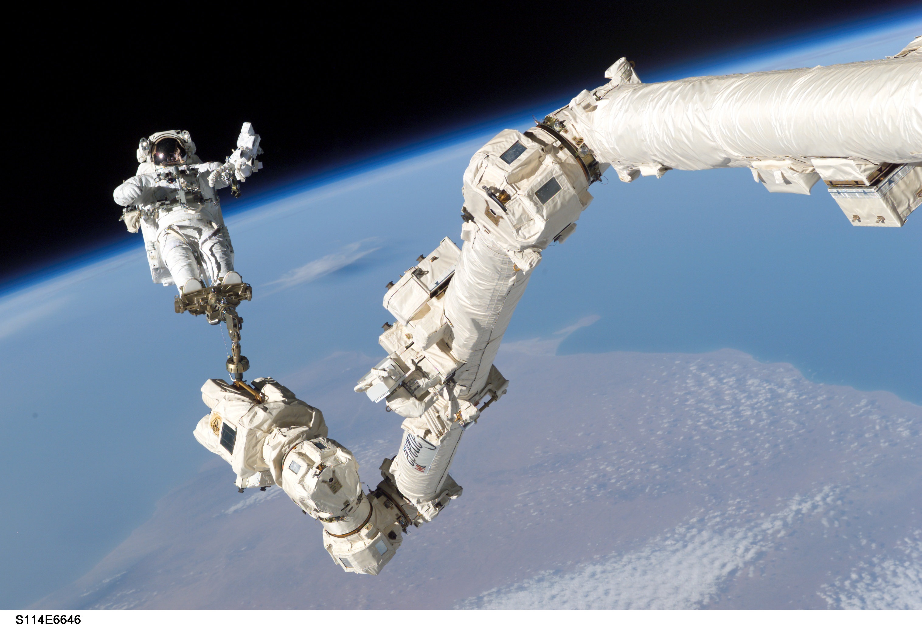 APOD: 2006 May 22 – Maneuvering in Space