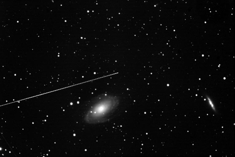 APOD: 2007 April 5 – Asteroid and Galaxy
