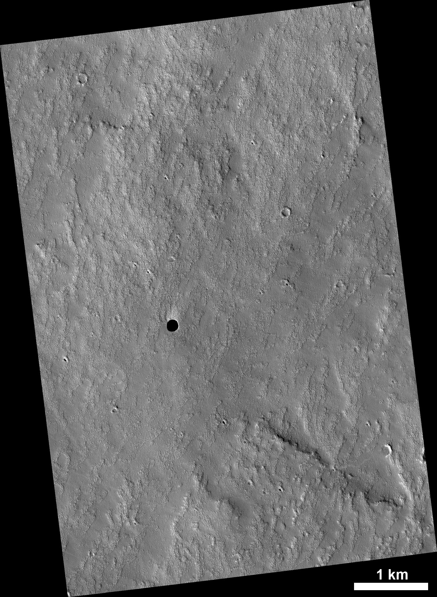 APOD: 2007 May 28 – A Hole in Mars