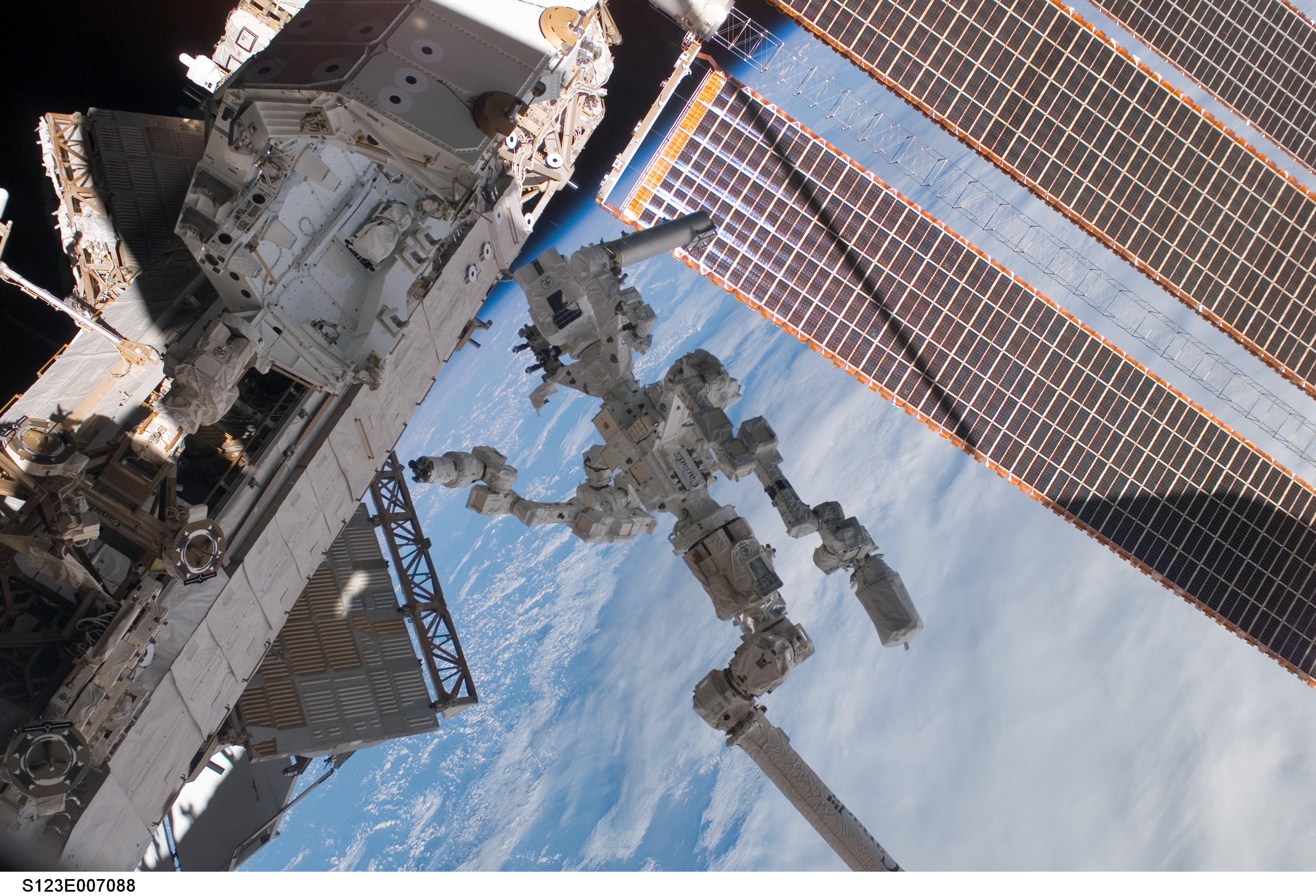 APOD: 2008 April 1- New Space Station Robot Asks to be Called Dextre the Magnificent
