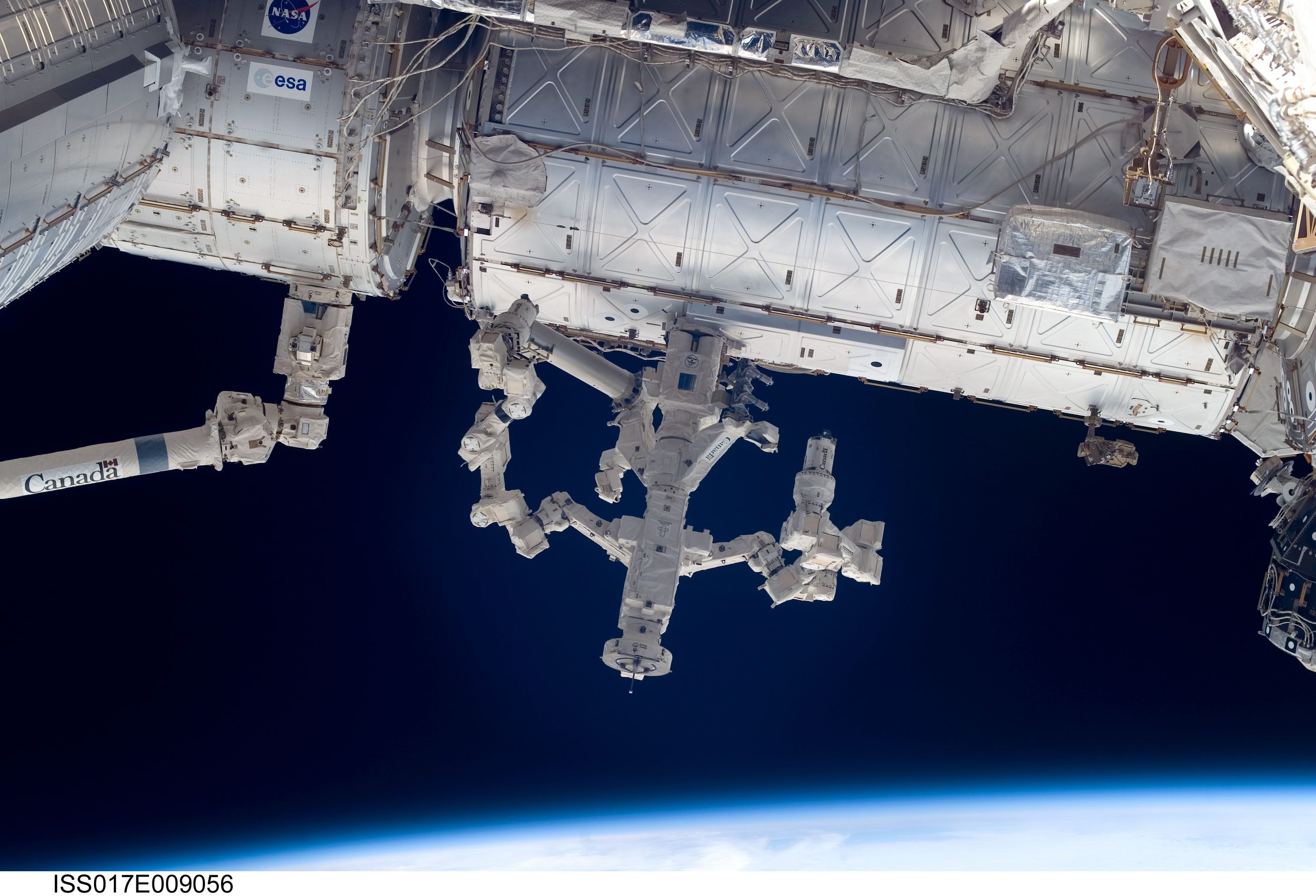 APOD: 2008 June 11 – Dextre Robot at Work on the Space Station