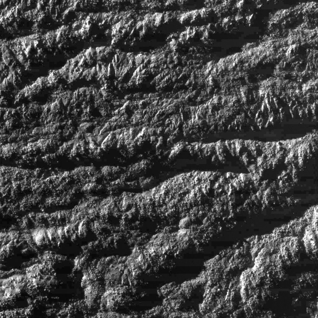 APOD: 2008 November 5 – Seventeen Hundred Kilometers Above Enceladus