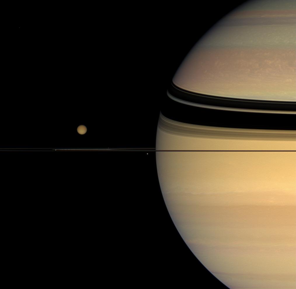 APOD: 2008 October 20 – Moons, Rings, and Unexpected Colors on Saturn