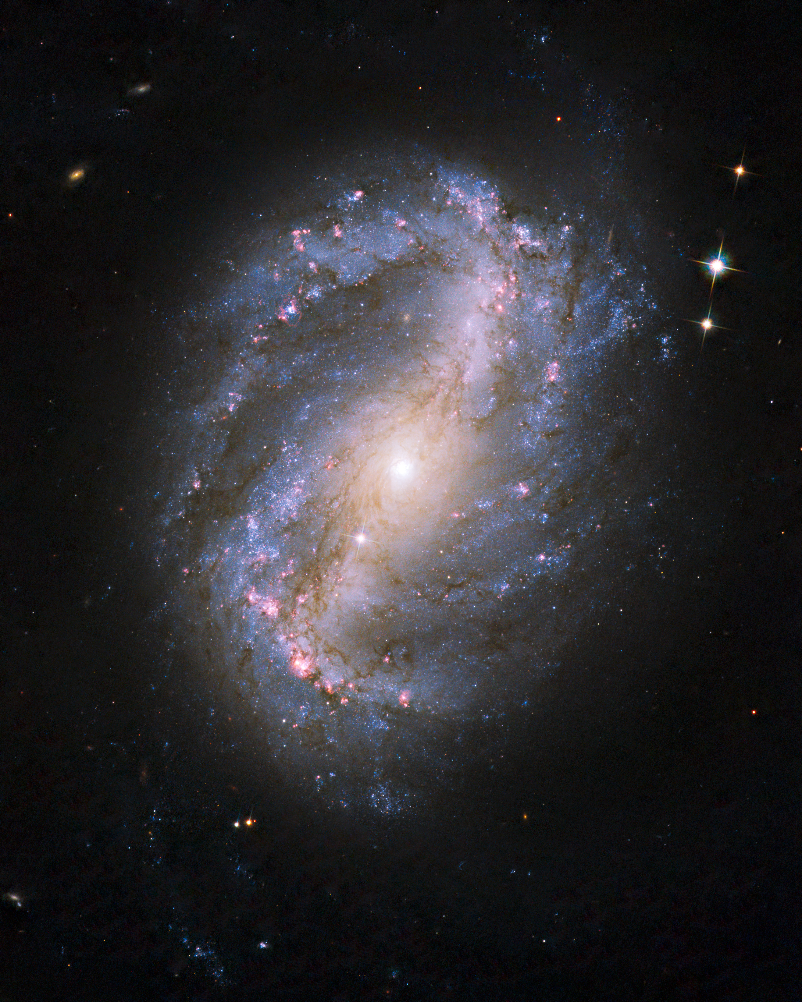 APOD: 2009 December 28 – Barred Spiral Galaxy NGC 6217