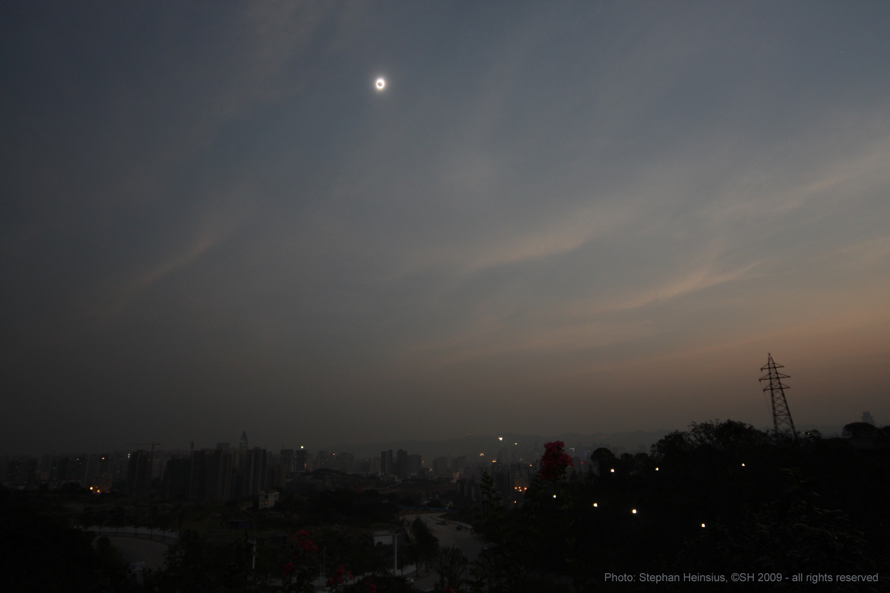 APOD: 2009 July 24 – Eclipse over Chongqing, China