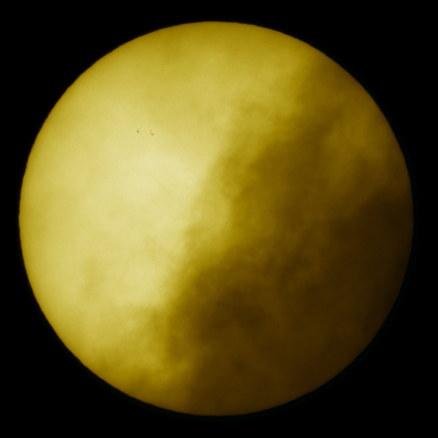 APOD: 2009 June 4 – Sunspots on a Cloudy Day