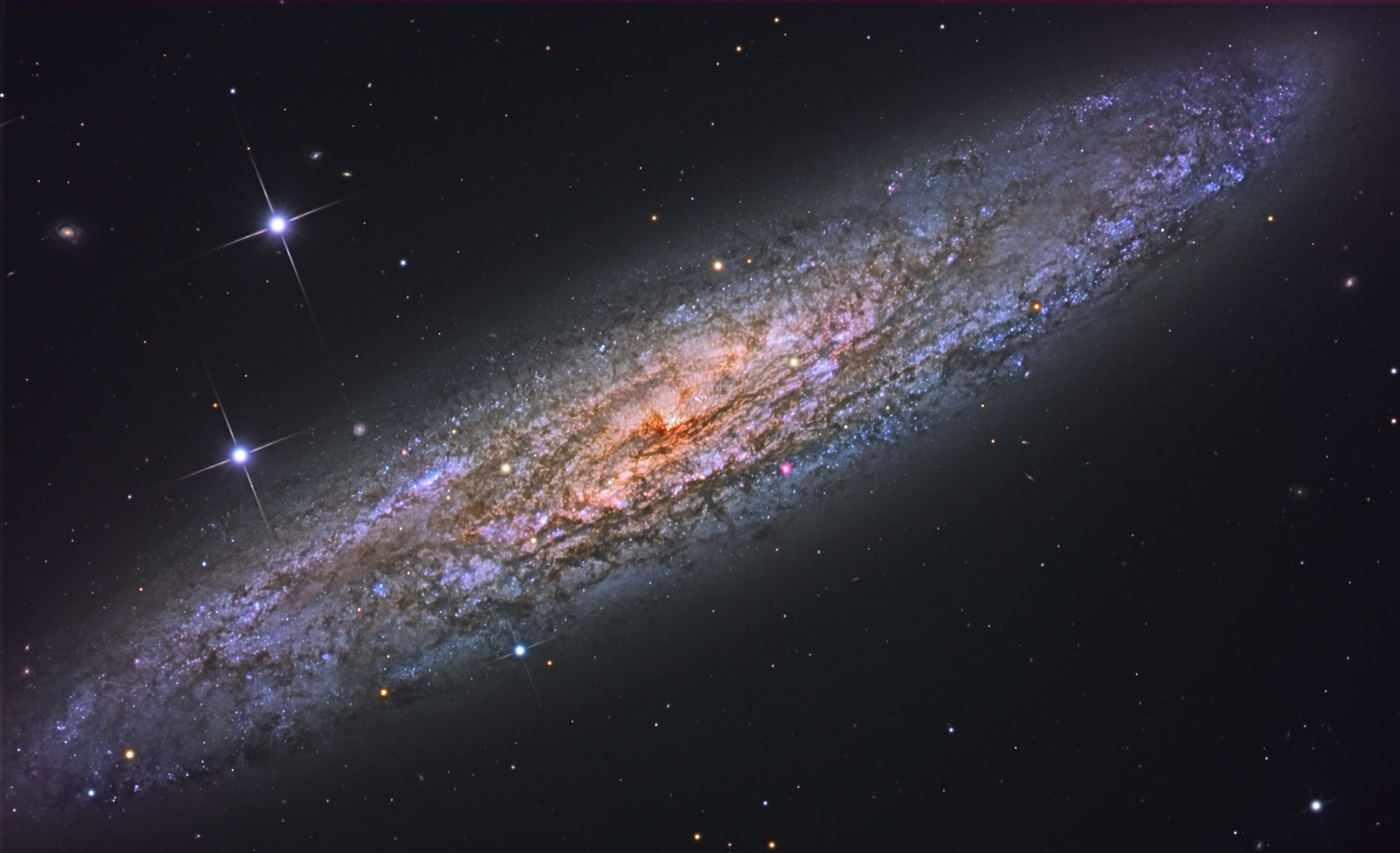 APOD: 2009 November 21 – NGC 253: Dusty Island Universe
