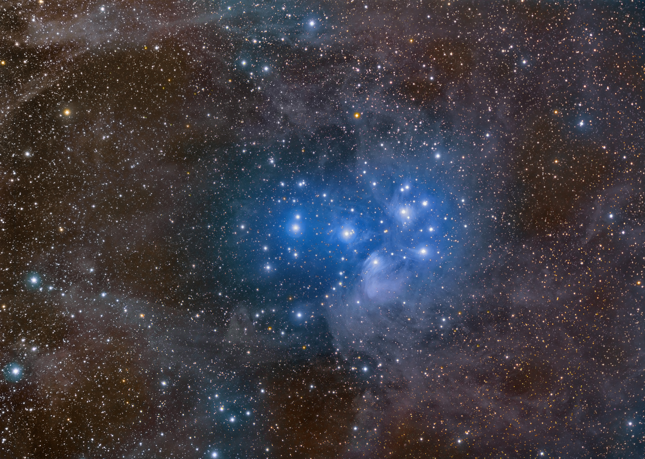 APOD: 2009 October 14 – Pleiades and Stardust