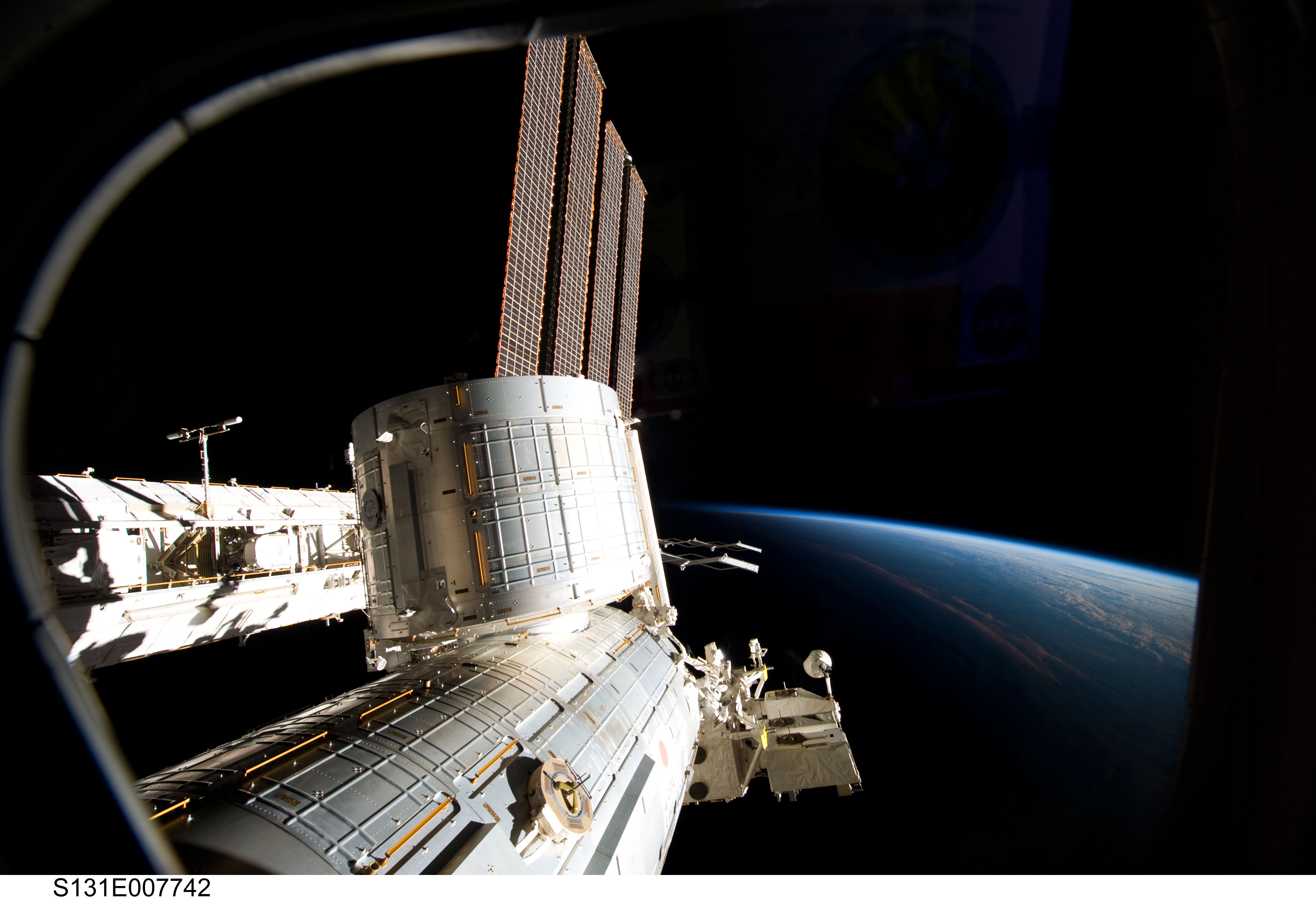 APOD: 2010 April 14 – A Large Space Station Over Earth