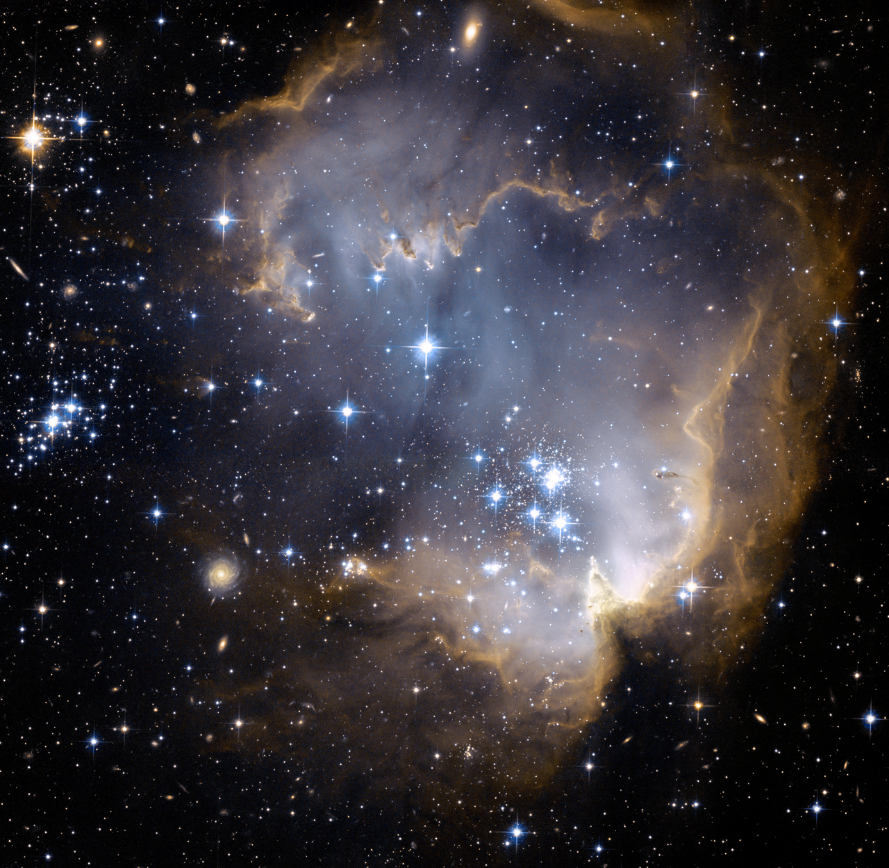 APOD: 2010 April 3 – NGC 602 and Beyond