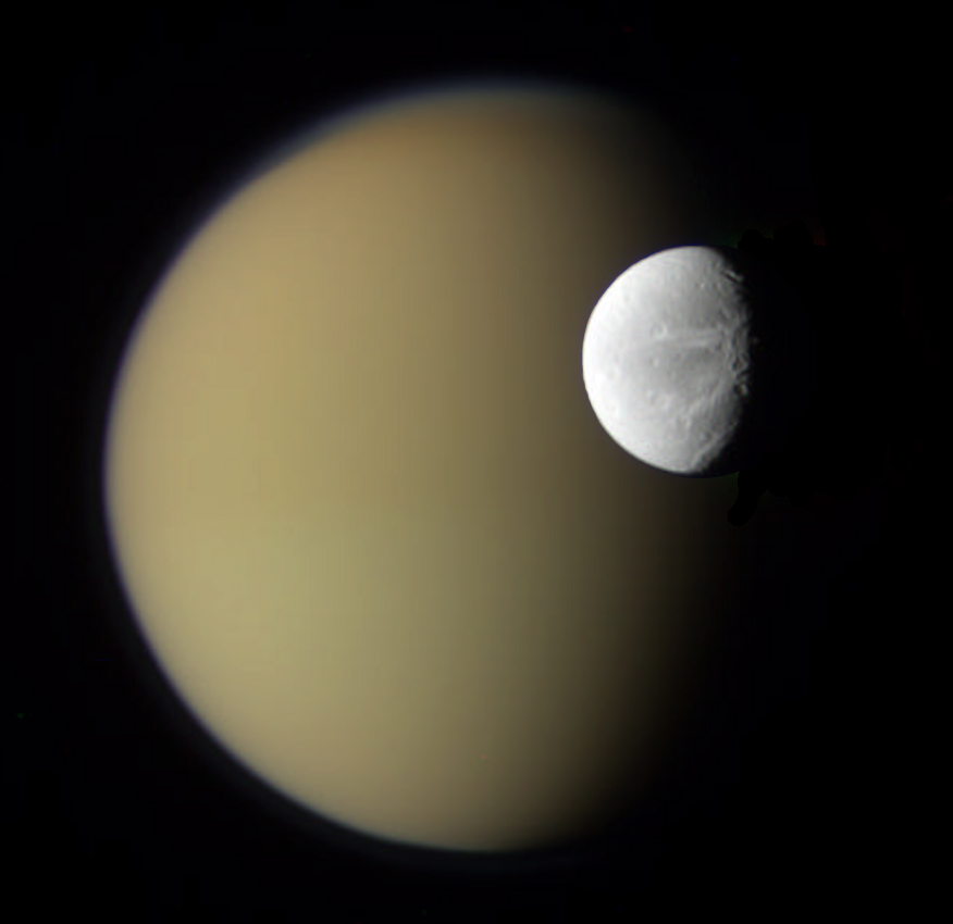 APOD: 2010 April 20 – Saturn’s Moons Dione and Titan from Cassini