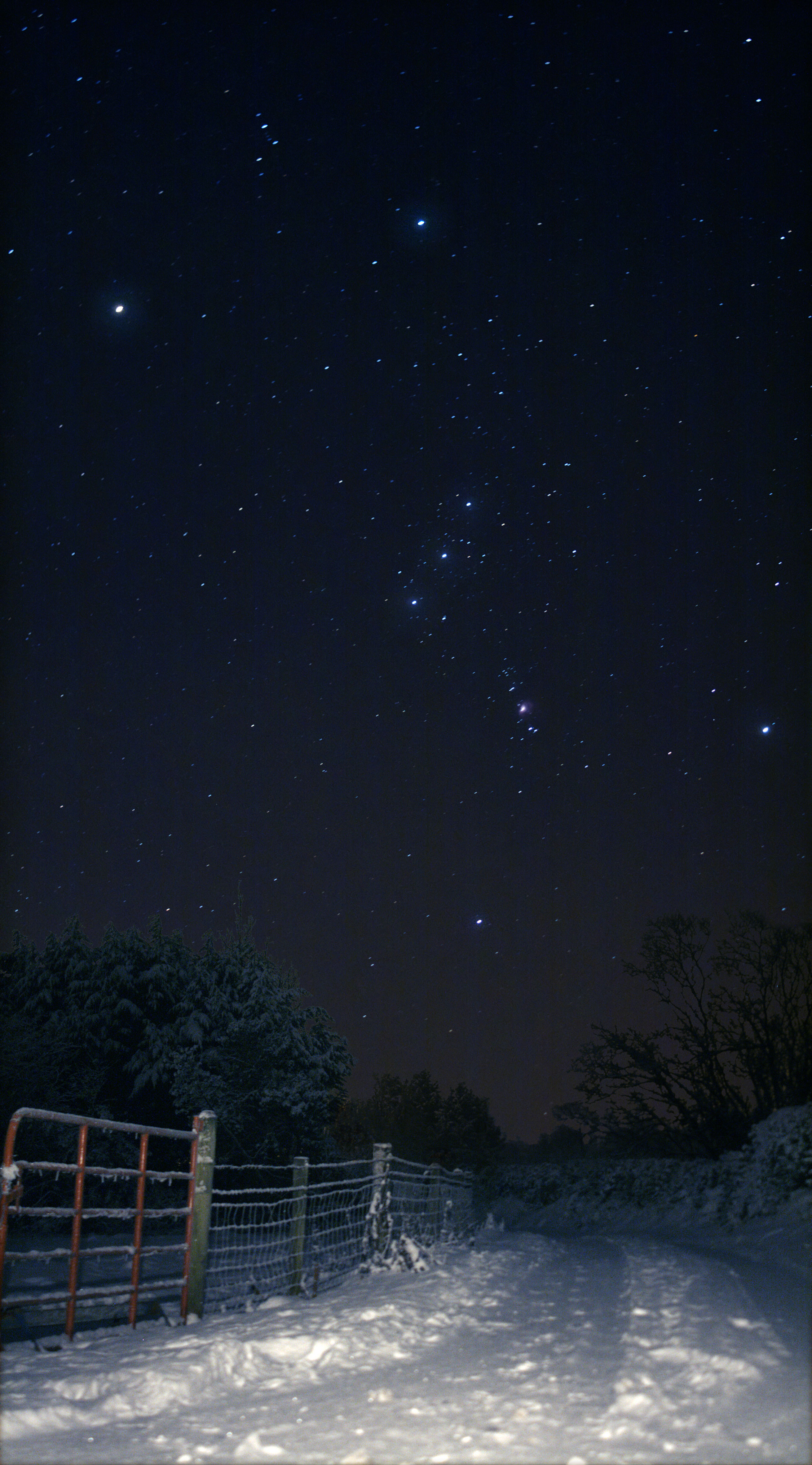 APOD: 2010 December 26 – Sideways Orion Over Snowy Ireland