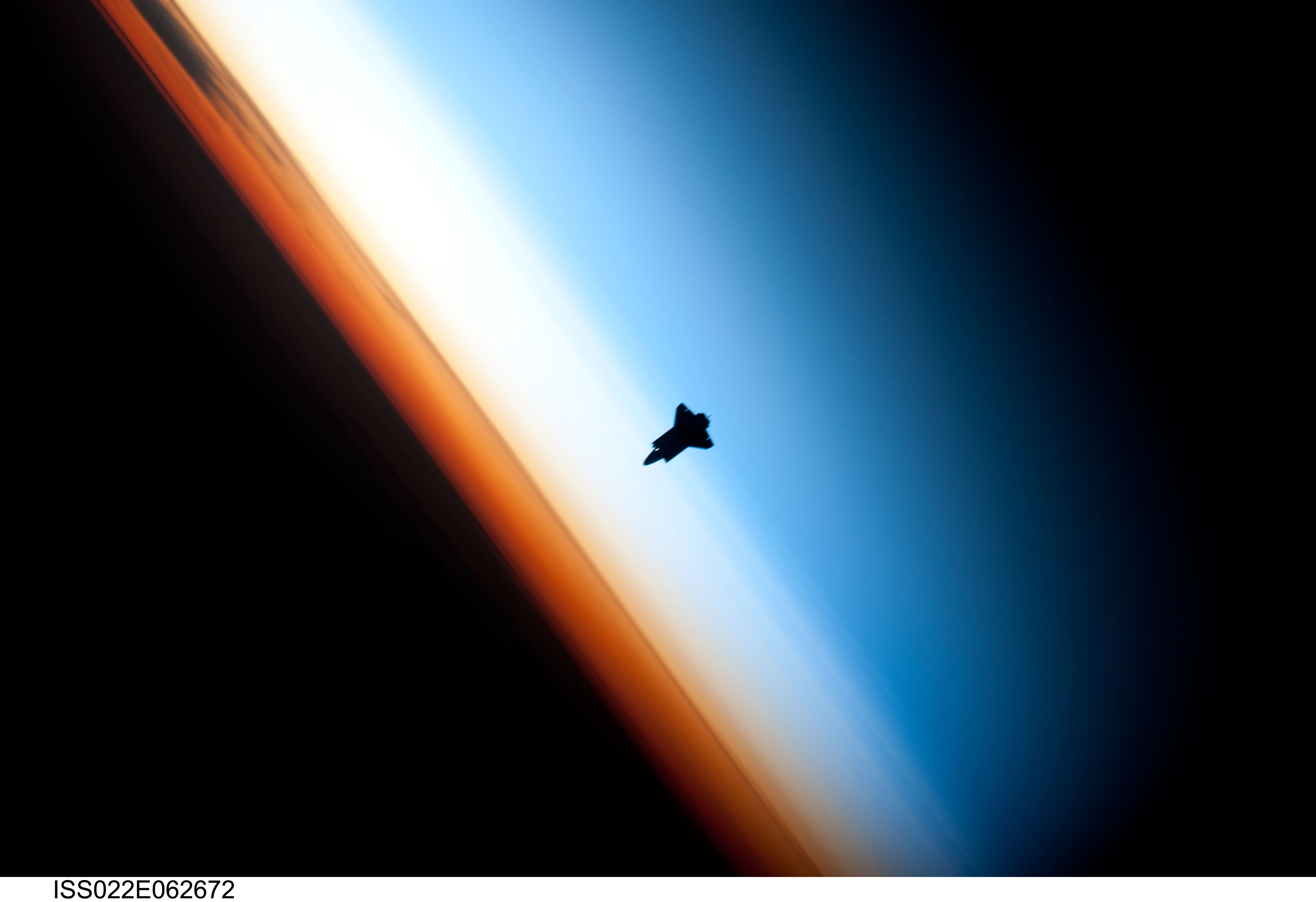 APOD: 2010 February 16 – Dark Shuttle Approaching