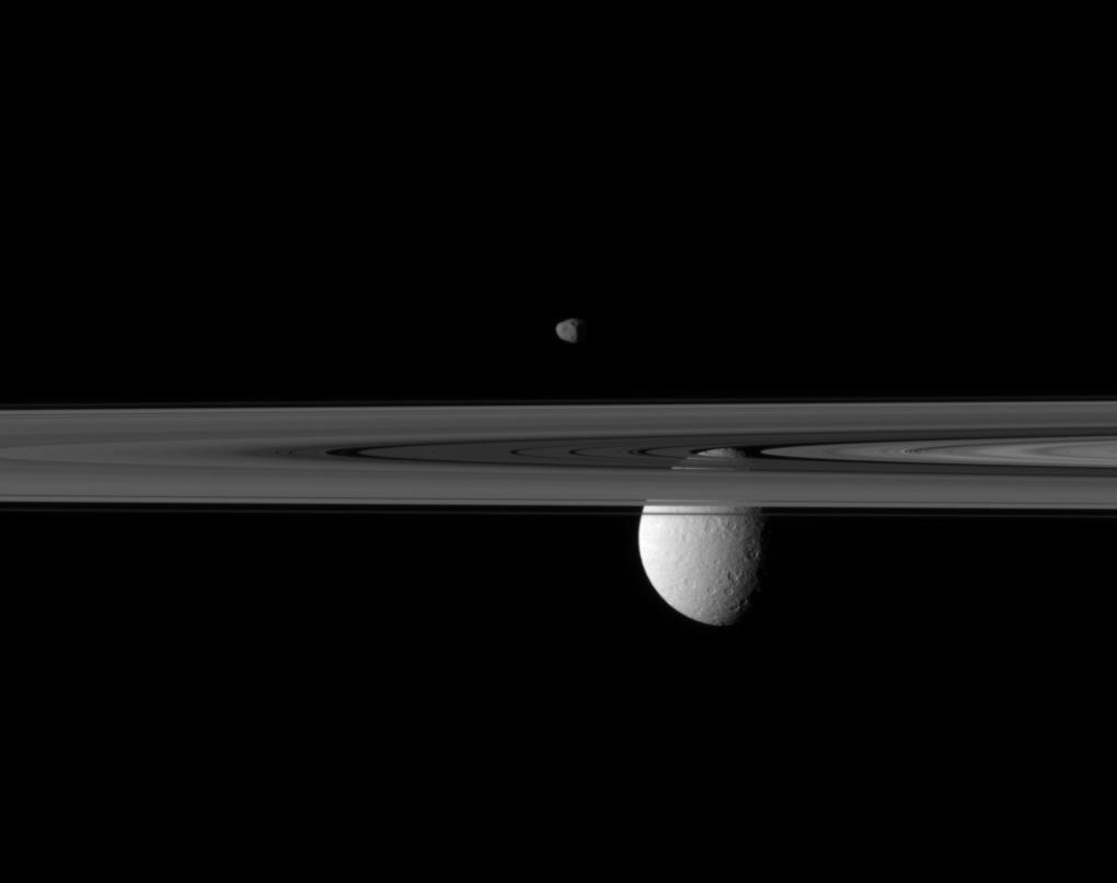 APOD: 2010 July 12 – Moons Beyond the Rings of Saturn