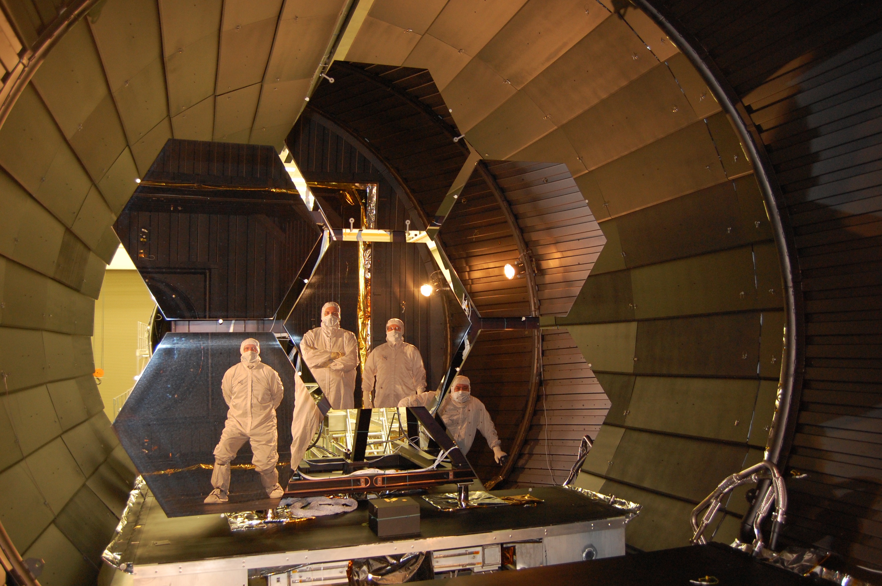APOD: 2010 March 12 – JWST: Mirrors and Masked Men