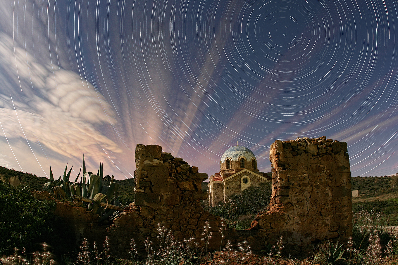 APOD: 2010 March 15 – Illuminated Cloud Trails Above Greece
