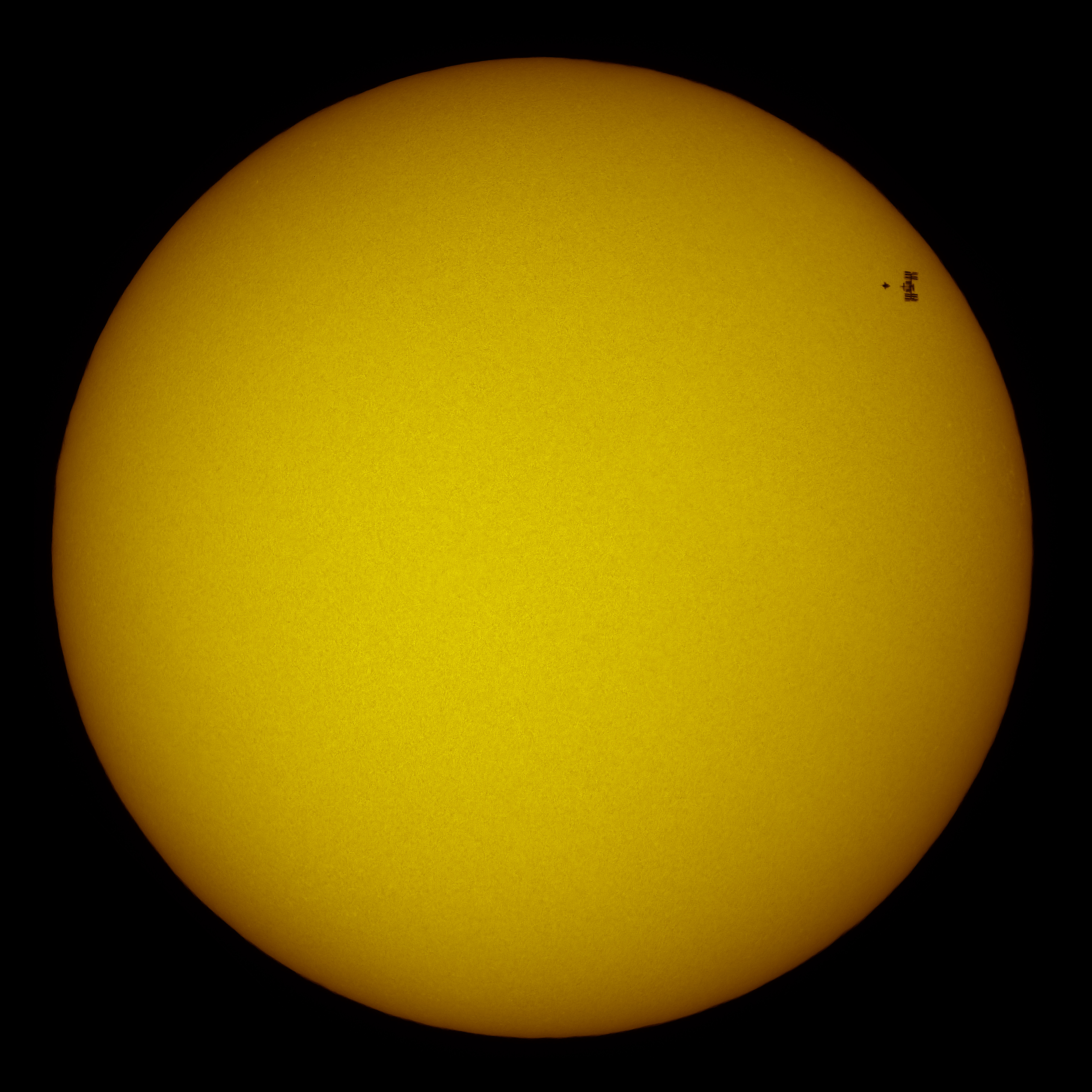 APOD: 2010 May 23 – Station and Shuttle Transit the Sun
