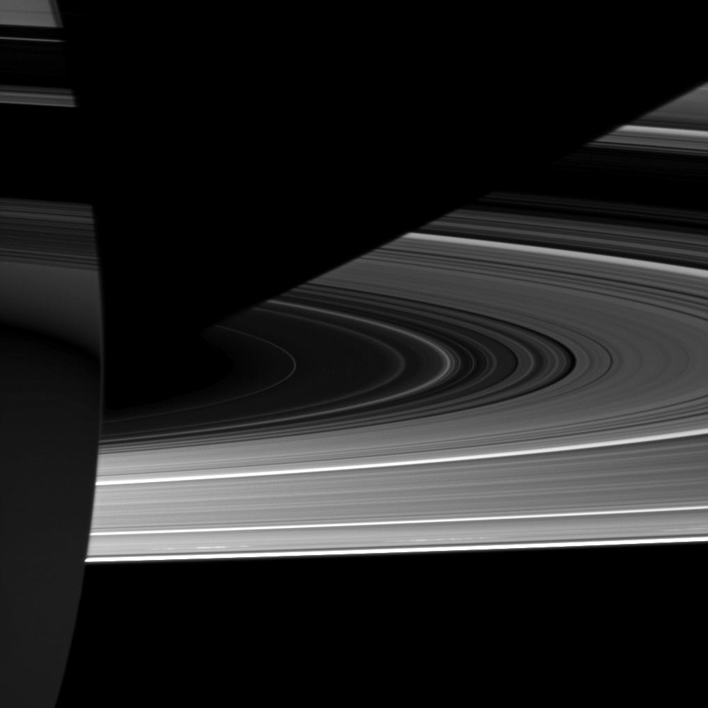 APOD: 2010 October 12 – Saturn: Light, Dark, and Strange