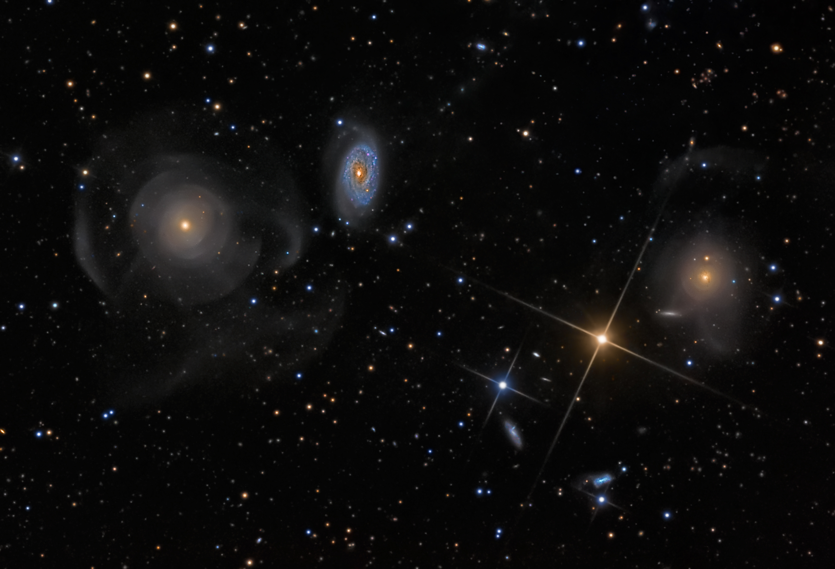 APOD: 2011 February 26 – Shell Galaxies in Pisces