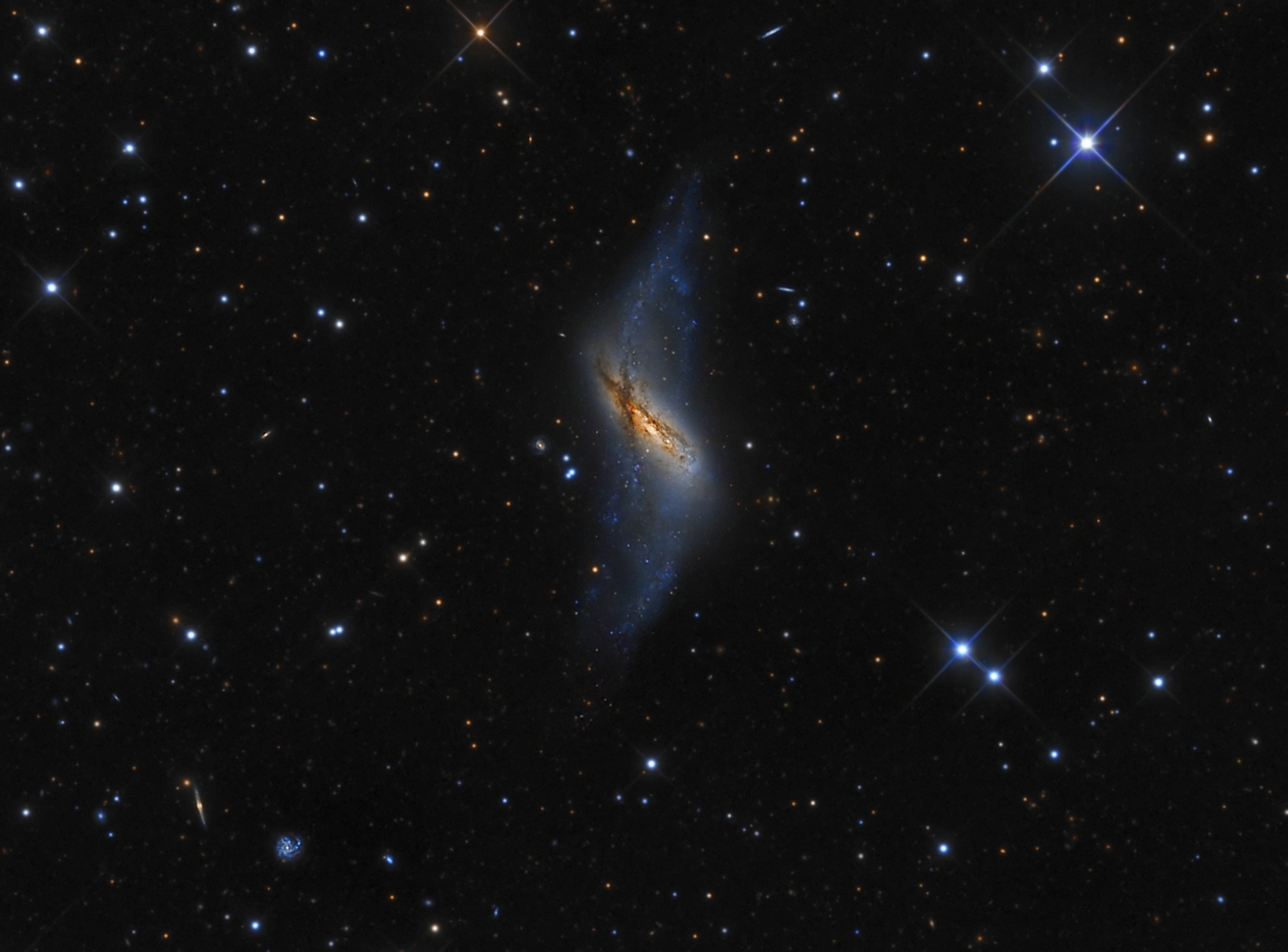 APOD: 2011 January 22 – Polar Ring Galaxy NGC 660
