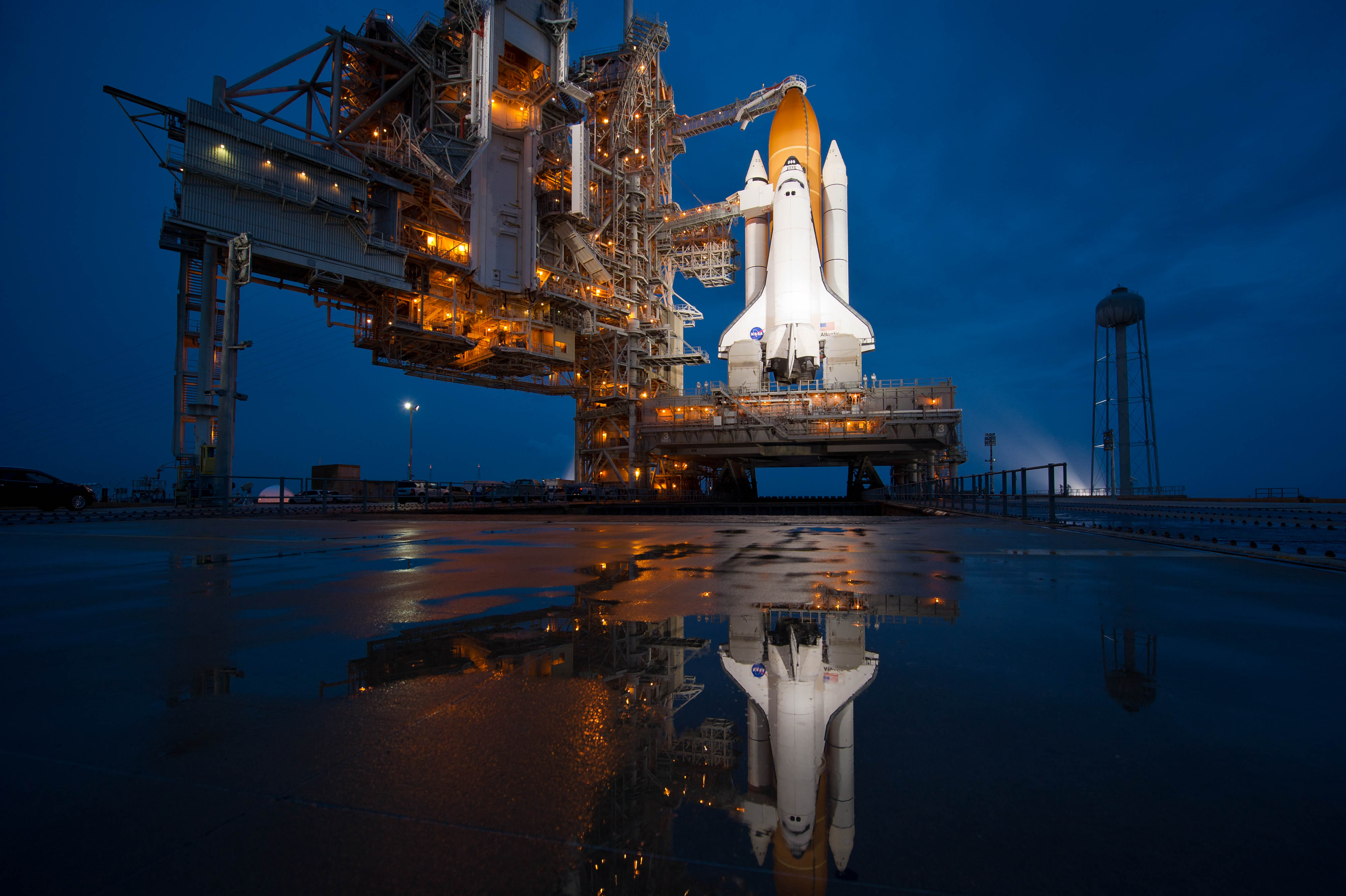 APOD: 2011 July 9 – Atlantis Reflection