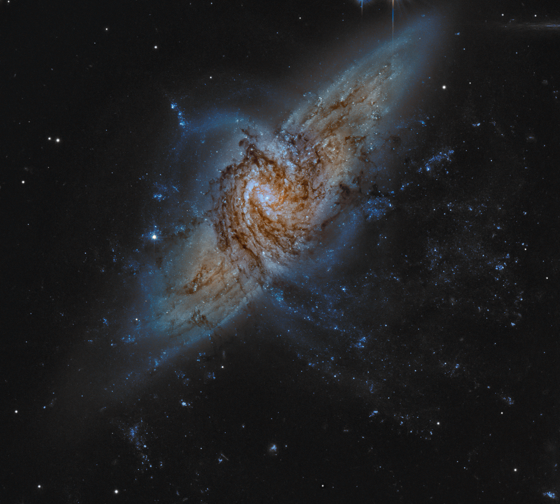 APOD: 2011 July 15 – NGC 3314: When Galaxies Overlap