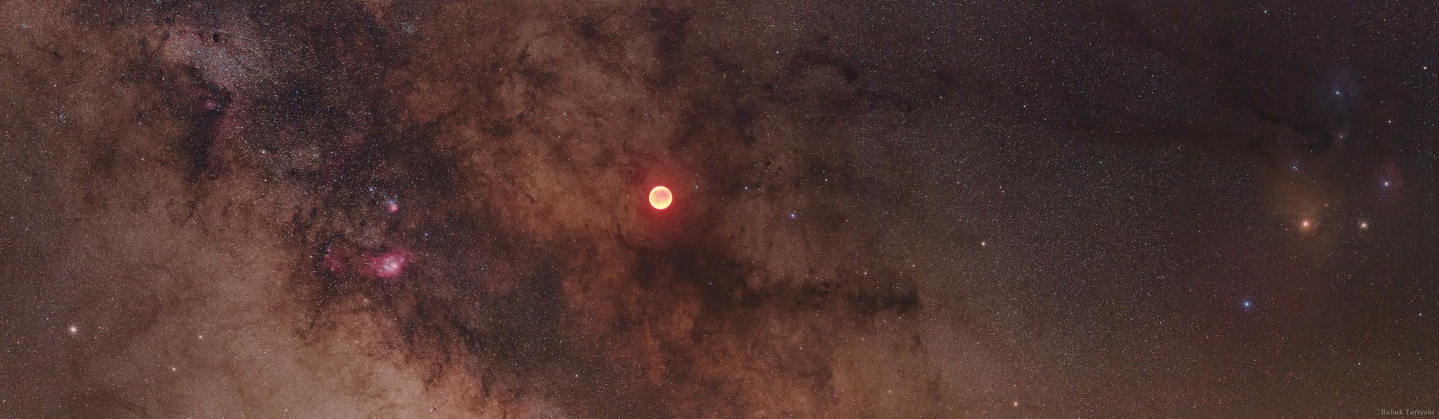 APOD: 2011 June 17 – Eclipsed Moon in the Milky Way